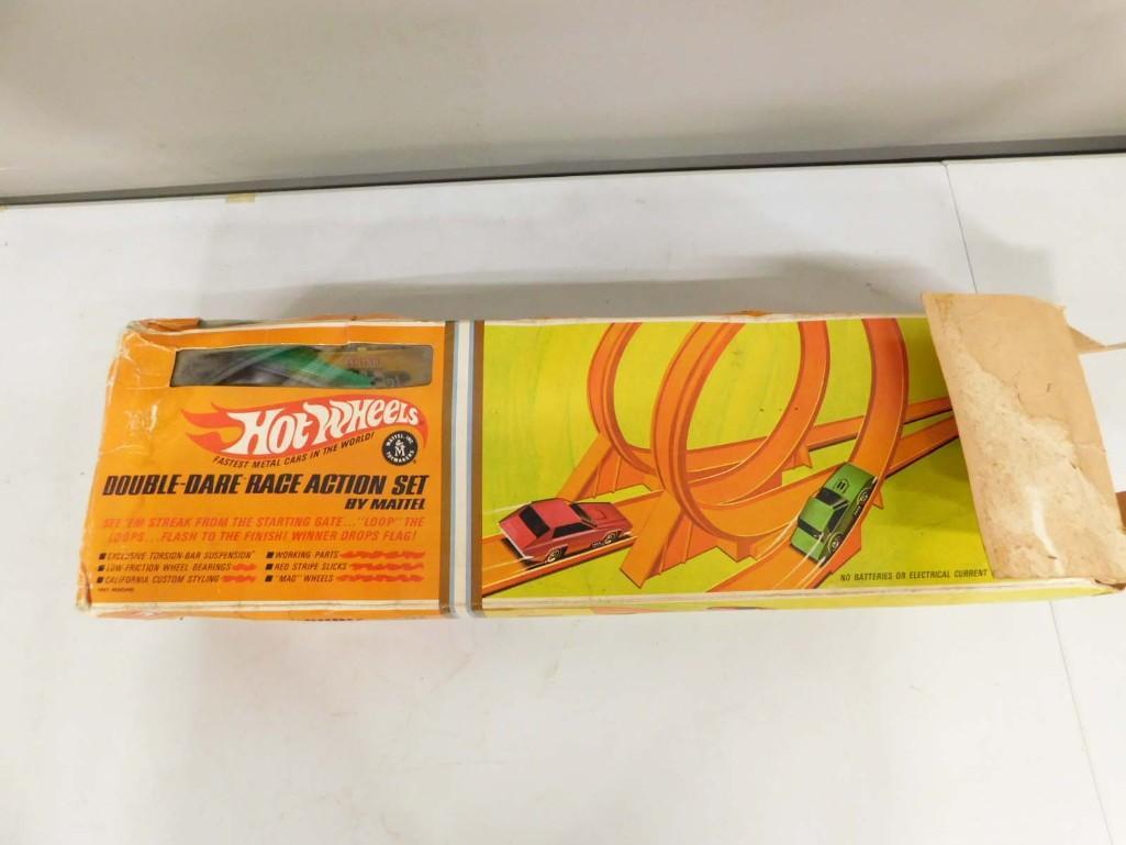 1967 Mattel Hot Wheels Double Dare Race Set: Vintage 1967 Mattel Hot Wheels Double Dare Race Set in original 1st issue box. Box has all flaps and cellophane window. Set is only missing one of the red line cars. Includes the correct number of tra