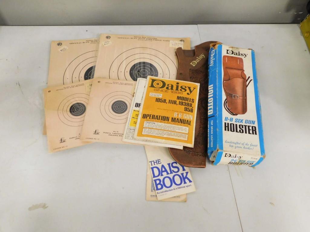 Lot of Daisy Manuals, Holsters, and Targets: Lot includes 4 manuals, 1 six gun holster in box, 1 rare rifle scabbard, 4 packs of targets