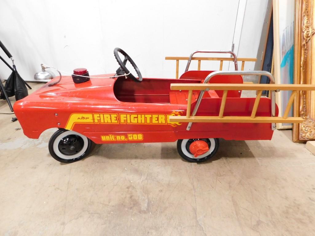 Vintage 1960s AMF Pedal Fire Truck: Vintage 1960s AMF Pedal Fire Truck . All original ! Great shape. Has just some tiny rust spots throughout. Nice decals. Missing the 2 front hub caps