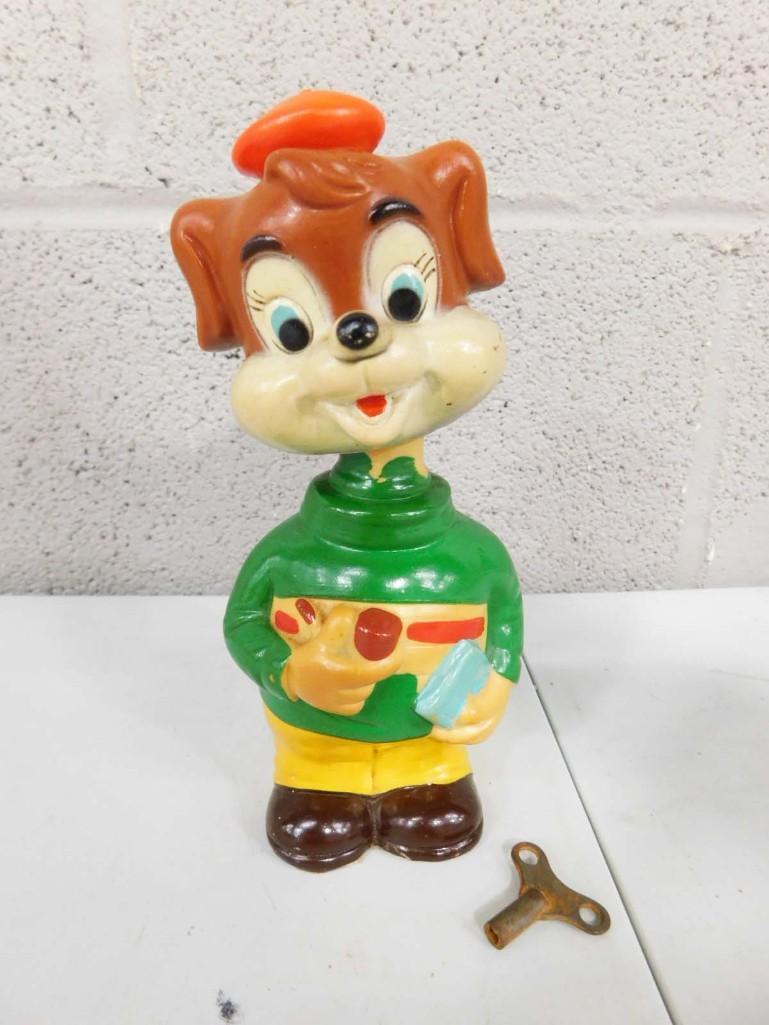 Wind Up Dog with Pipe, Spinning Tail, Moving Head Alps Toys Made in Japan: Wind Up Dog with Pipe, Spinning Tail, Moving Head Alps Toys Made in Japan . Includes the Key