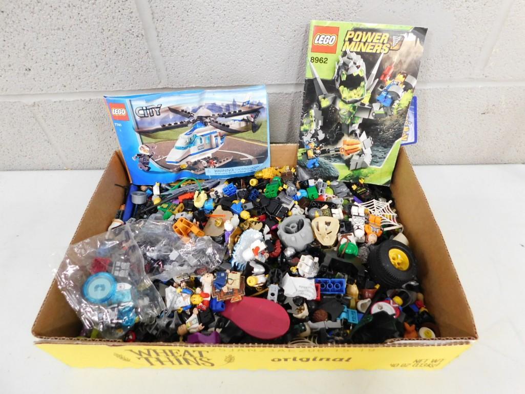 Lot of Assorted Lego Pieces and possibly other building blocks: Lot of Assorted Lego Pieces and possibly other building blocks Includes some instructions, but unclear if the pieces are there for the instructions. Lots of good pieces though.