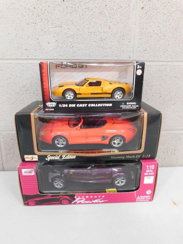 Lot of 3 Toy Cars with boxes 1/24 and 1/18 scale: Lot of 3 Toy Cars with boxes 1/24 and 1/18 scale including Ford GT Motor Max, Mustang Mach III Maisto, and Plymouth Prowler,