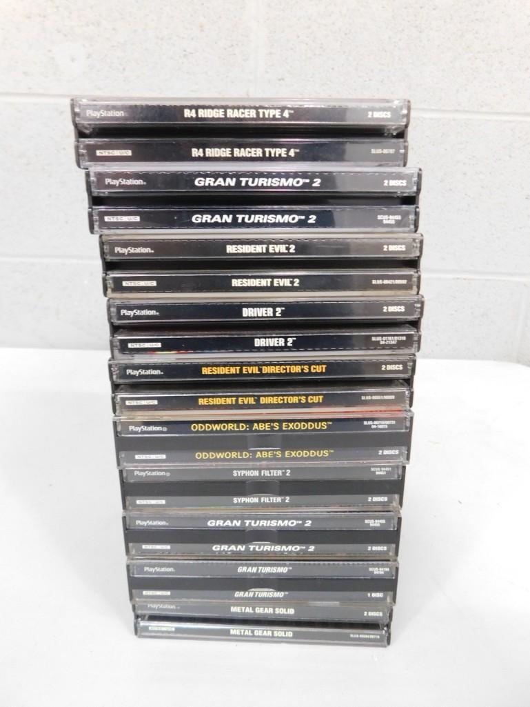 Lot of 10 Sony PlayStation Double Disk Games: Lot of 10 Sony PlayStation Double Disk Games including R4 Ridge Racer, Gran Turismo 2, Resident Evil 2, Driver 2, Resident Evil Director's Cut, Oddworld: Abe's Exoddus, Syphon Filter 2, Gran T