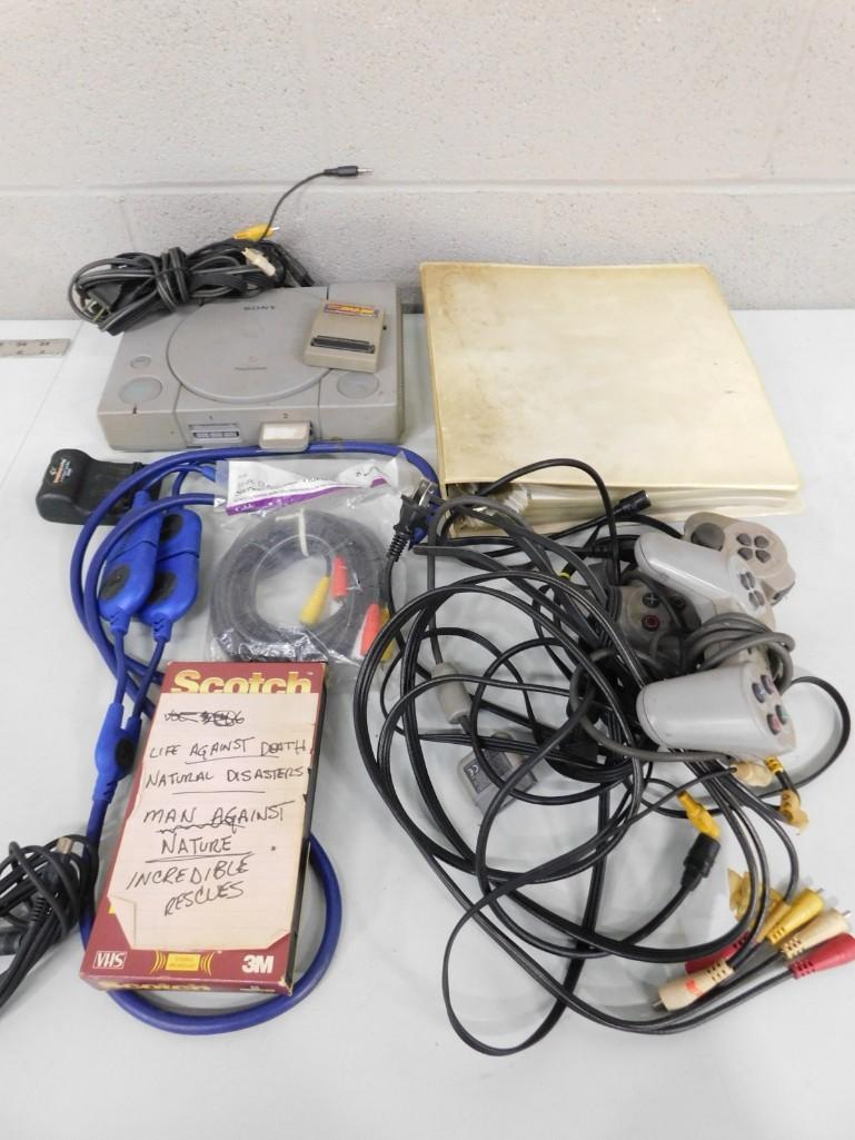 Sony PlayStation System Lot including controllers, wires, etc.: Sony PlayStation System Lot including controllers, wires, etc. - untested, comes with everything shown. Some sort of Doom Strategy and other ephemera included.