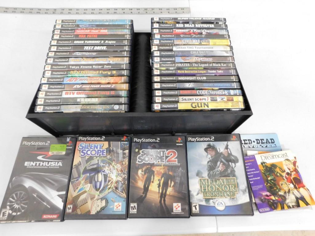 Lot of 34 Sony PlayStation 2 Video Games and Case: Lot of 34 Sony PlayStation 2 Video Games and Case Including Silent Scope 2, Medal of Honor Frontline, Silent Scope 1,2 and 3, ATV games, Metal Gear Solid, Midnight Club, Test Drive, Gran Turismo 3, Ma