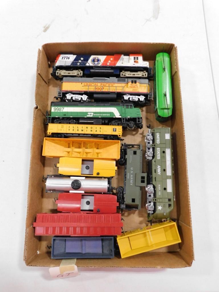 Lot of HO Scale Train Cars including Engines, etc.: Lot of H0 Scale Train Cars including Engines, etc. Union Pacific 2007, Burlington Northern, Illinois Terminal, Texaco, US Army, etc.