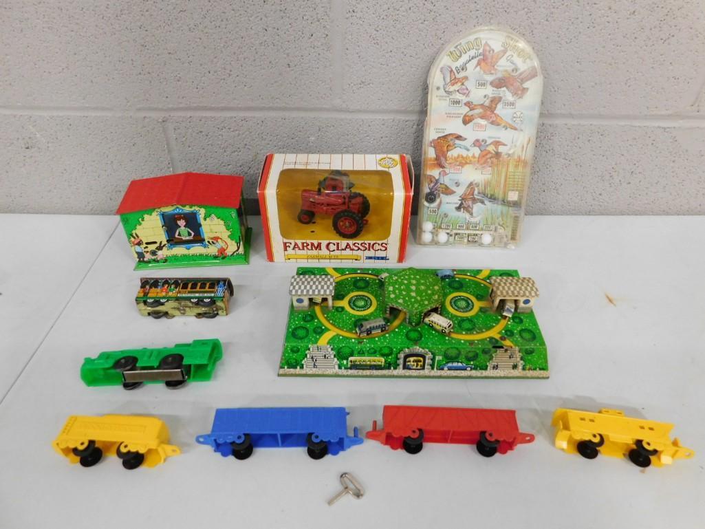 Toy Lot incl Vintage Tin Litho Car Path, Tin Litho Coin Bank, Tin Litho Pull Back Trolley,: Toy Lot incl Vintage Tin Litho Car Path, Tin Litho Coin Bank, Tin Litho Pull Back Trolley, Die Cast Farmall Farm Classics Tractor, Marble Game, Plastic Train Set