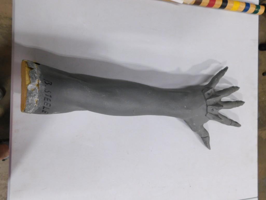 Prop Creature Arm Marked B Steele: Prop Creature or Monster Arm Marked B Steele . We don't know where it's from but it could be from a Barbara Steele Film. Made of Resin and Foam. Nice overall condition. Comes with a COA from S