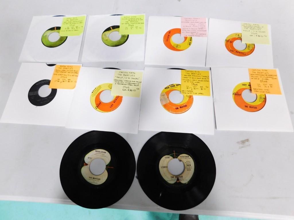 8 The Beatles 45 RPM Vinyl Records: Lot of 8 The Beatles 45 RPM Vinyl Records in Blank Sleaves plus 2 that are not in sleaves (and these 2 are quite scratched) , Includes Help, Nowhere Man, Get Back, Hey Jude, I Want To Hold Your Hand, 