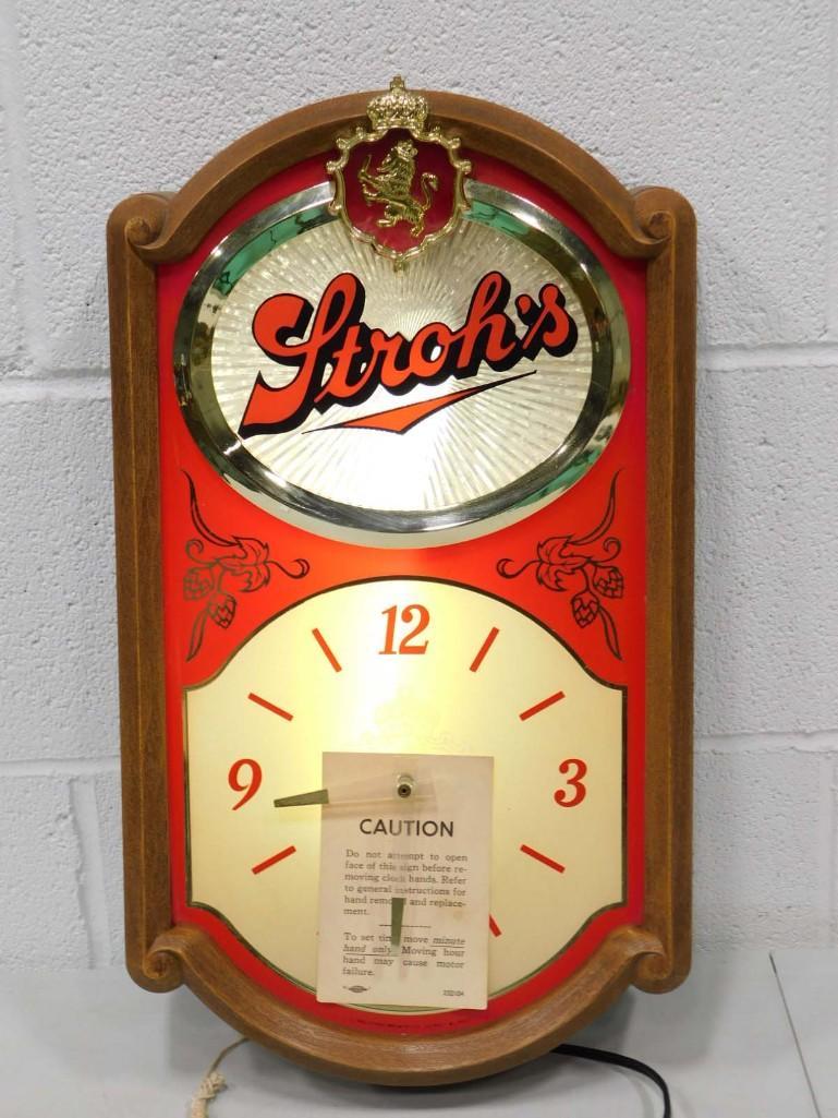 Stroh's Wall Clock Lights Up and Works: Stroh's Wall Clock Lights Up and Works . Approx 17" Tall