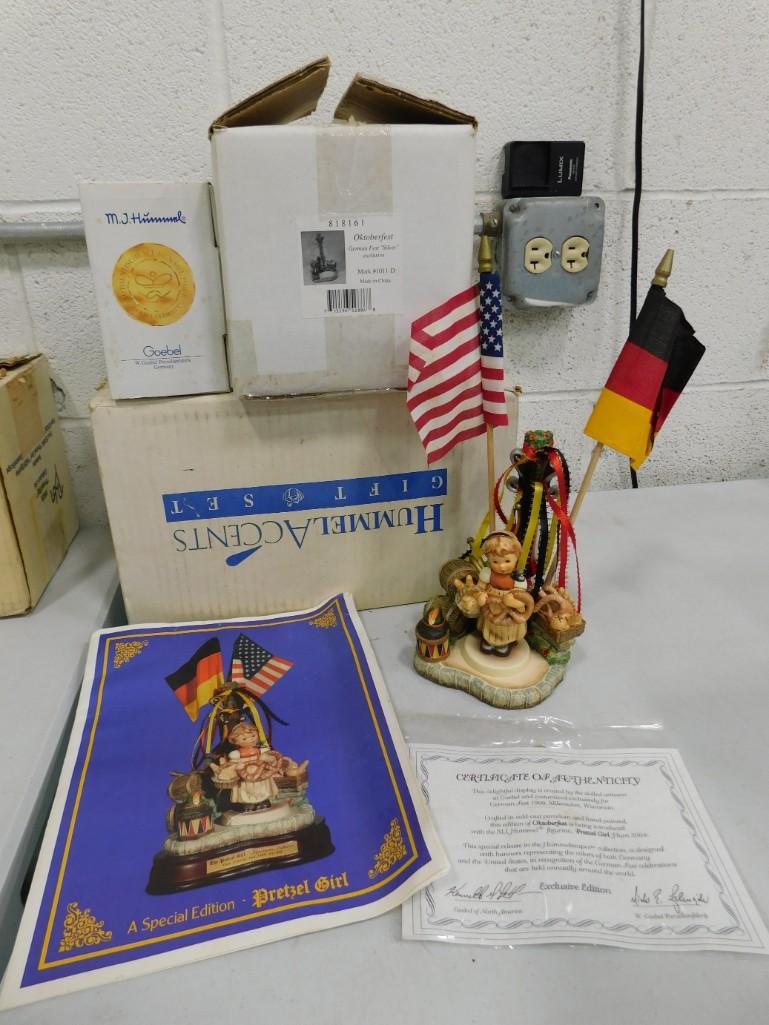 Goebel Hummel Pretzel Girl w Oktoberfest Hummelscape #1011- D Exclusive for German Fest, Milwaukee: Goebel Hummel Pretzel Girl signed on the bottom w Oktoberfest Hummelscape #1011- D Exclusive for German Fest, Milwaukee, Wisconsin July 23-25, 1999 . Both have original boxes