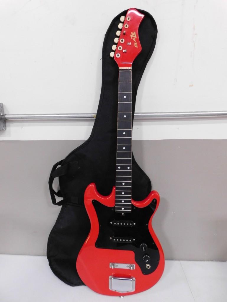 Harmony Blaze Electric Guitar with Soft Case: Harmony Blaze Electric Guitar with Soft Case . Approx 38.5" Long . Condition: no strings, untested