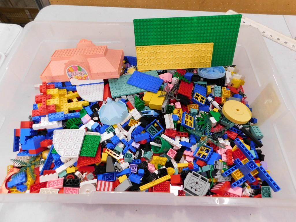 Bin of Legos and Other Toy Building Blocks: Bin of Lego pieces and Other Toy Building Blocks . Includes some mini figs