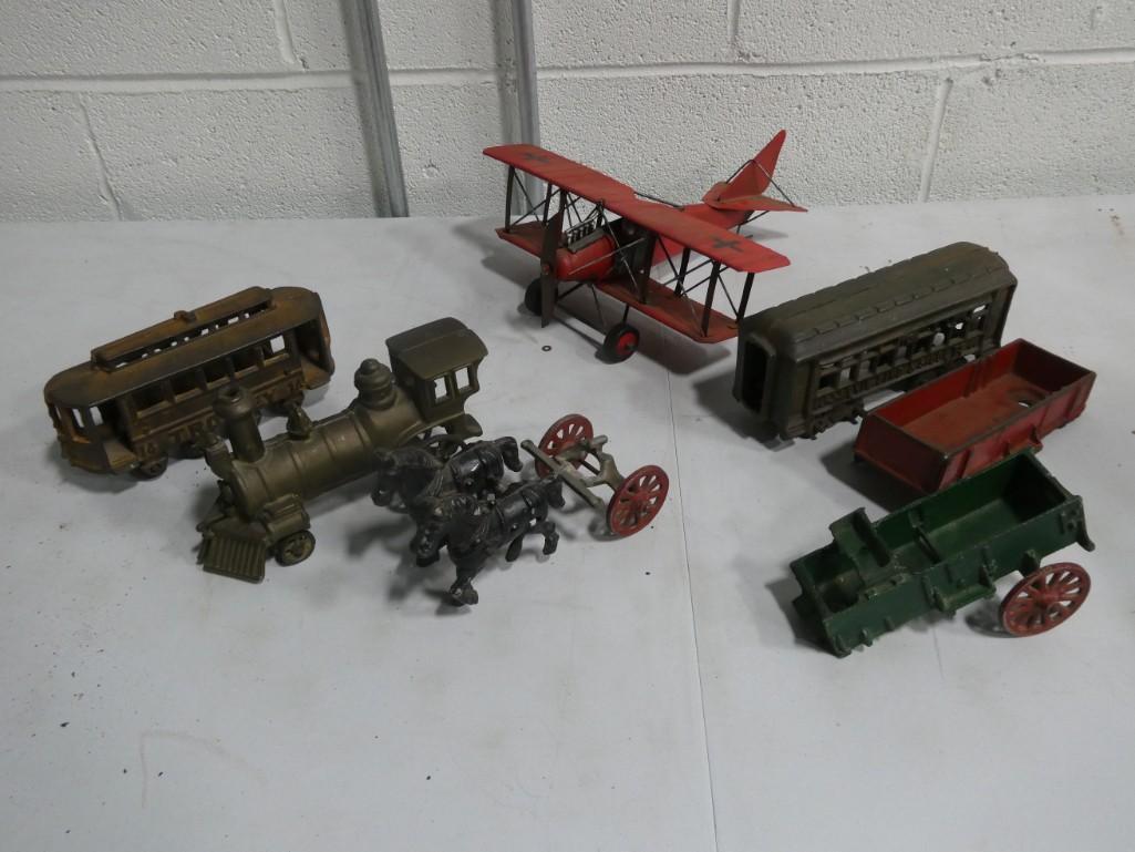 Vintage Cast Iron and other Metal Toys including trains, airplane, horse and carriage (1 of 7)