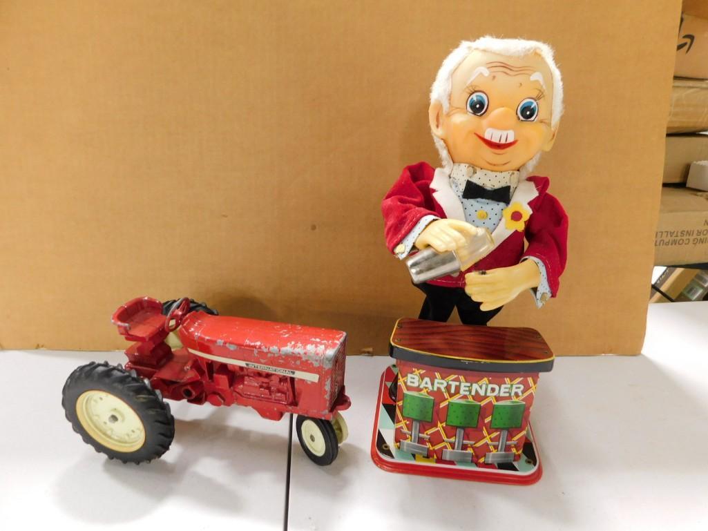 International Harvester Toy Tractor and a Wind Up Bartender Toy: International Harvester Toy Tractor and a Wind Up Bartender Toy