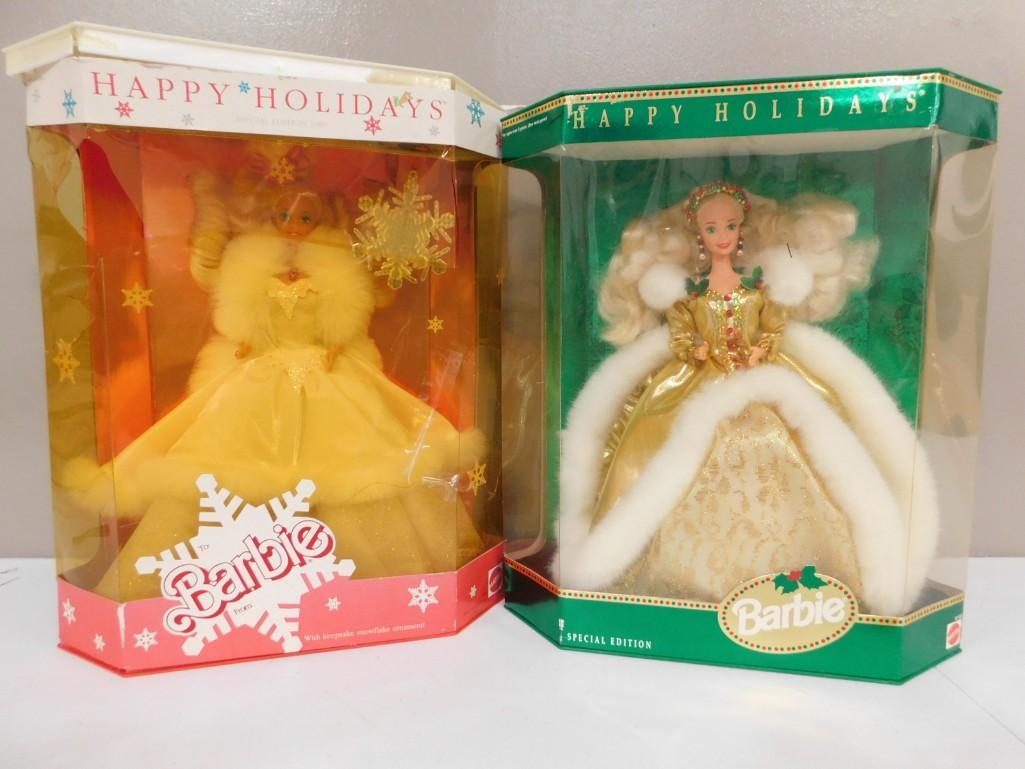 2 Happy Holidays Barbie Dolls incl 1989 and 1994 in Original Boxes: 2 Happy Holidays Barbie Dolls incl 1989 and 1994 in Original Boxes Condition: both are in original packaging but the 1989 has damage to the box including tears and age yellowing to the plastic in fron