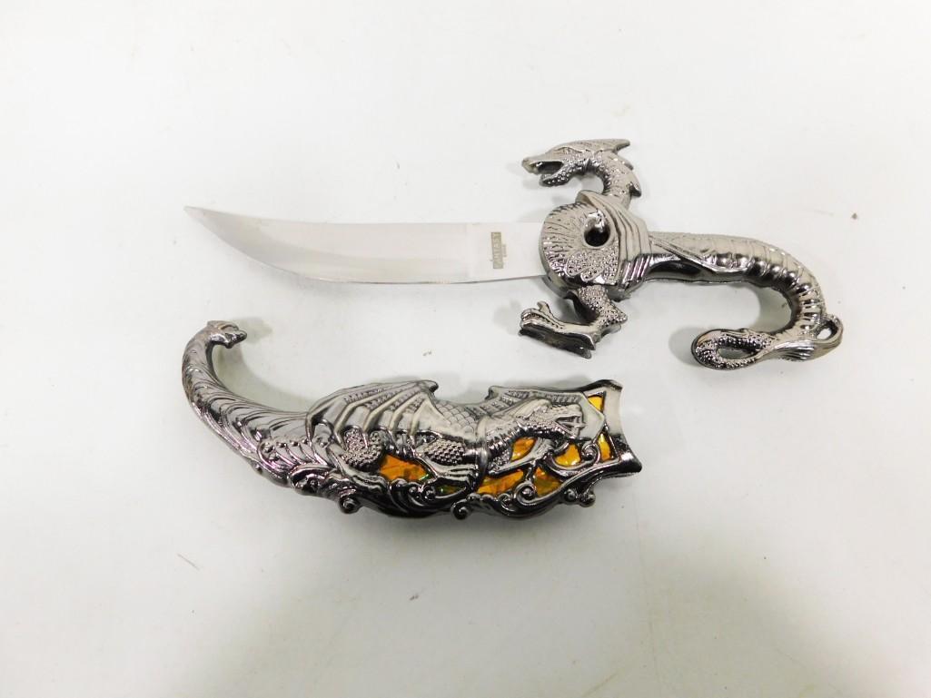Knife with Dragon Handle and Sheath Stainless Steel Blade and Metal Handle: Knife with Dragon Handle and Sheath Stainless Steel Blade and Metal Handle . Total length from the tip of the handle to the tip of the sheath is approx 9"