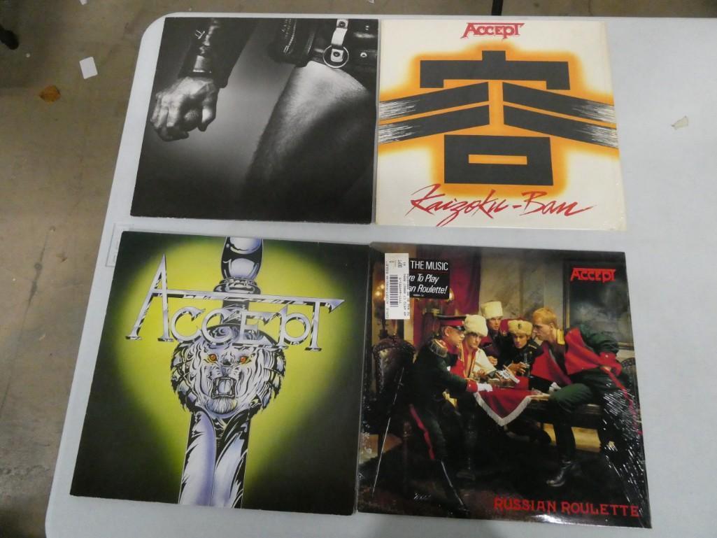 Accept - German Heavy Metal Band - 4 Vinyl Records: Accept - German Heavy Metal Band - 4 Vinyl Records - includes Kaizoku-Ban, Russian Roulette, Balls to the Wall. The back cover may look like a Christian Rock band, but they are hard core and big influ