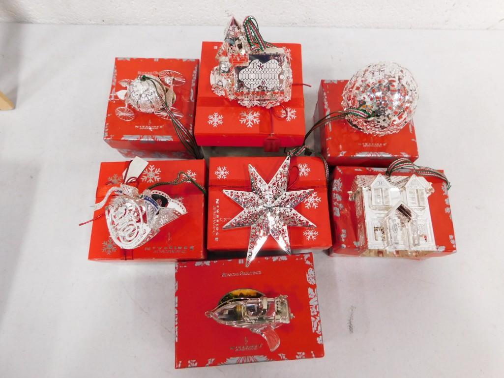 7 Newbridge Silverware Silver Plated Christmas Ornaments: 7 Newbridge Silverware Silver Plated Christmas Ornaments. All are in original boxes except the star is in an incorrect box.