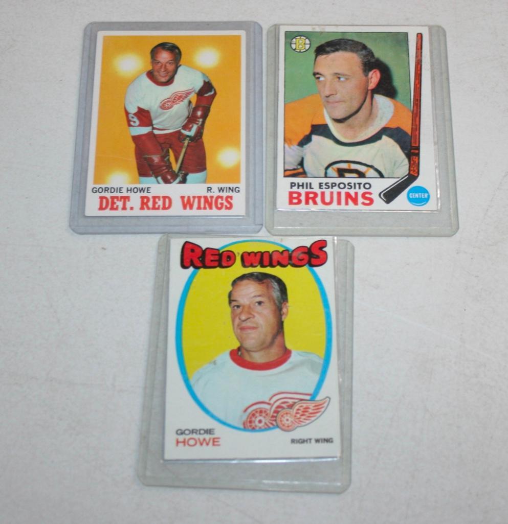 Old Topps Hockey Cards With Gordie Howe and Phil Esposito: Old Topps Hockey Cards With Gordie Howe and Phil Esposito. 1969-70 Topps #30 Phil Esposito with some gum/wax stains. 1970-71 Topps #29 Gordie Howe with a bend. 1971-72 Topps #70 Gordie Howe in very ni