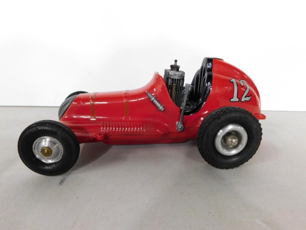 Roy Cox Thimble Drome Champion Tether Car Gas Powered: Roy Cox Thimble Drome Champion Gas Powered Tether Car Made in Santa Ana , California . In great shape. When you turn the wheel, there is compression. Measures approx 10" long