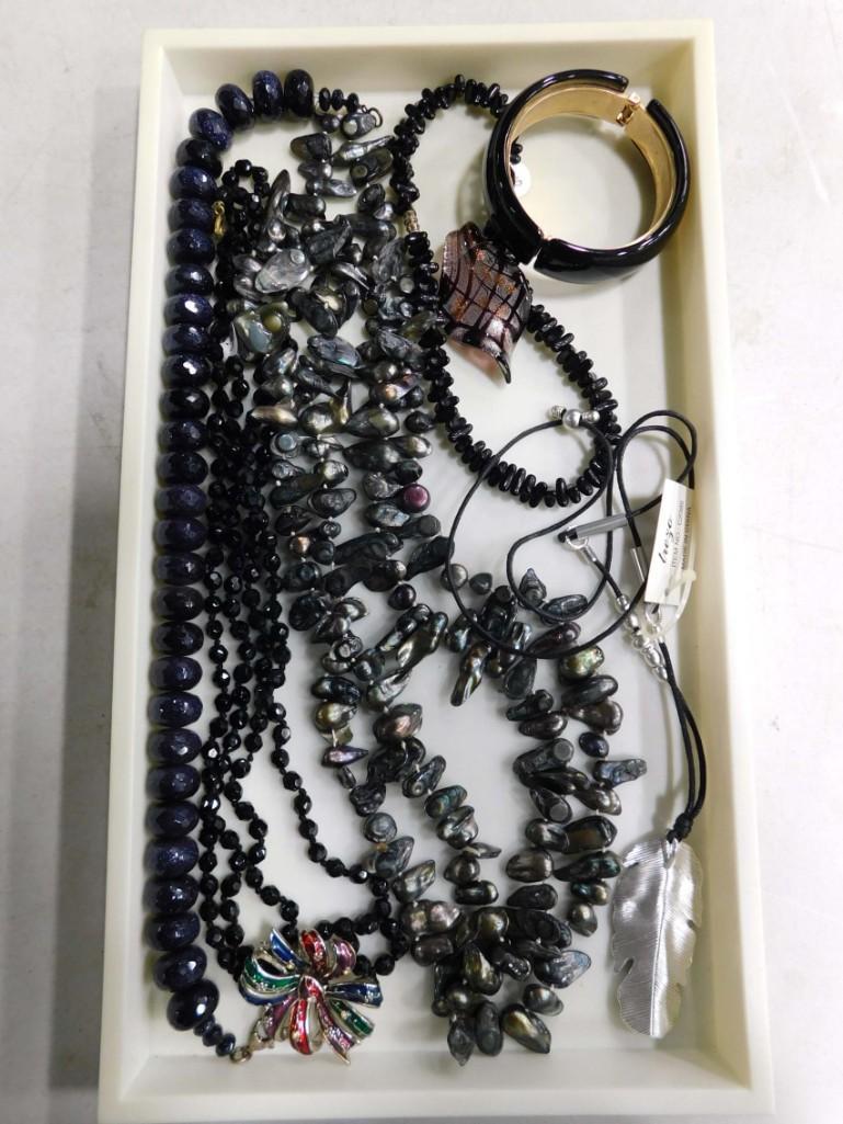 Lot of Costume Jewelry includes Trezo, Joan Rivers Broach: Lot of Costume Jewelry includes Trezo, Joan Rivers Broach - Tray is not included. We will bag these for you. Condition: the glass pendant has repairs