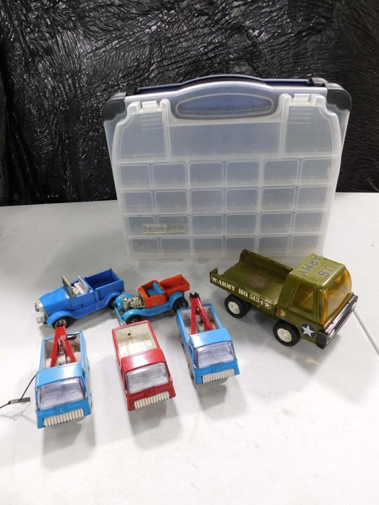 Lot of Toys Trucks incl Vintage Pressed Steel, Tonka, Buddy L, etc: Lot of Toys Trucks incl Vintage Pressed Steel, Tonka, Buddy L, etc . Includes vintage Tonka pressed steel tow trucks, vintage Buddy L pressed steel army truck, etc . Also included is a plastic case