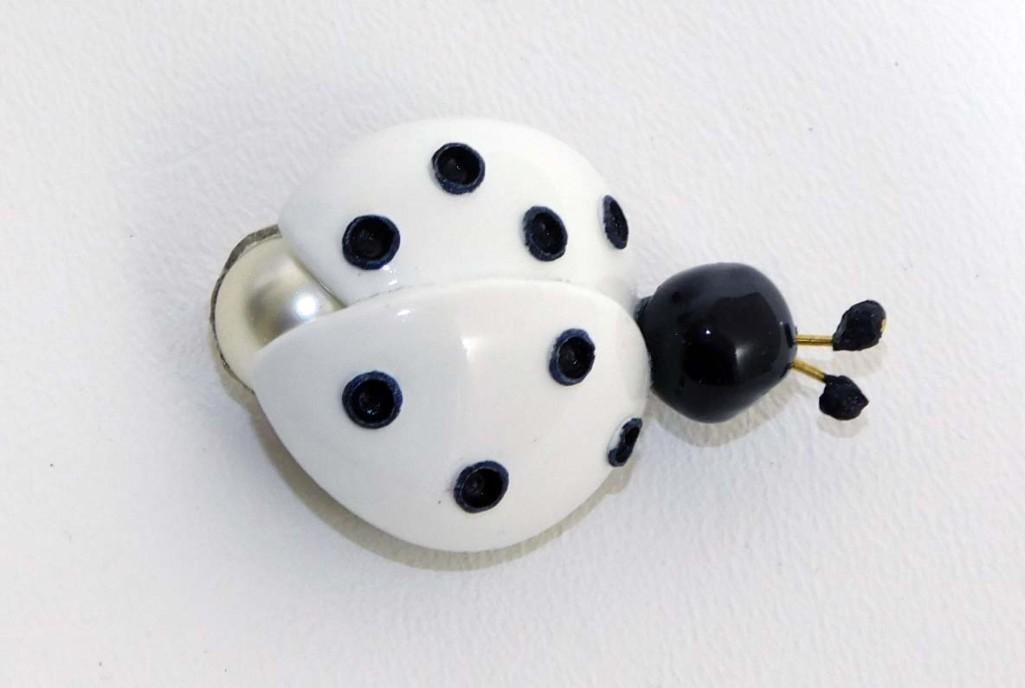 Fabrice Paris Pin or Brooch White Ladybug Black Dots: Fabrice Paris Pin or Brooch White Ladybug Black Dots - Approx. 2" Length - PLEASE NOTE: any props, stands, displays, trays, and/or quarters shown in the pictures are not included with the item(s) 