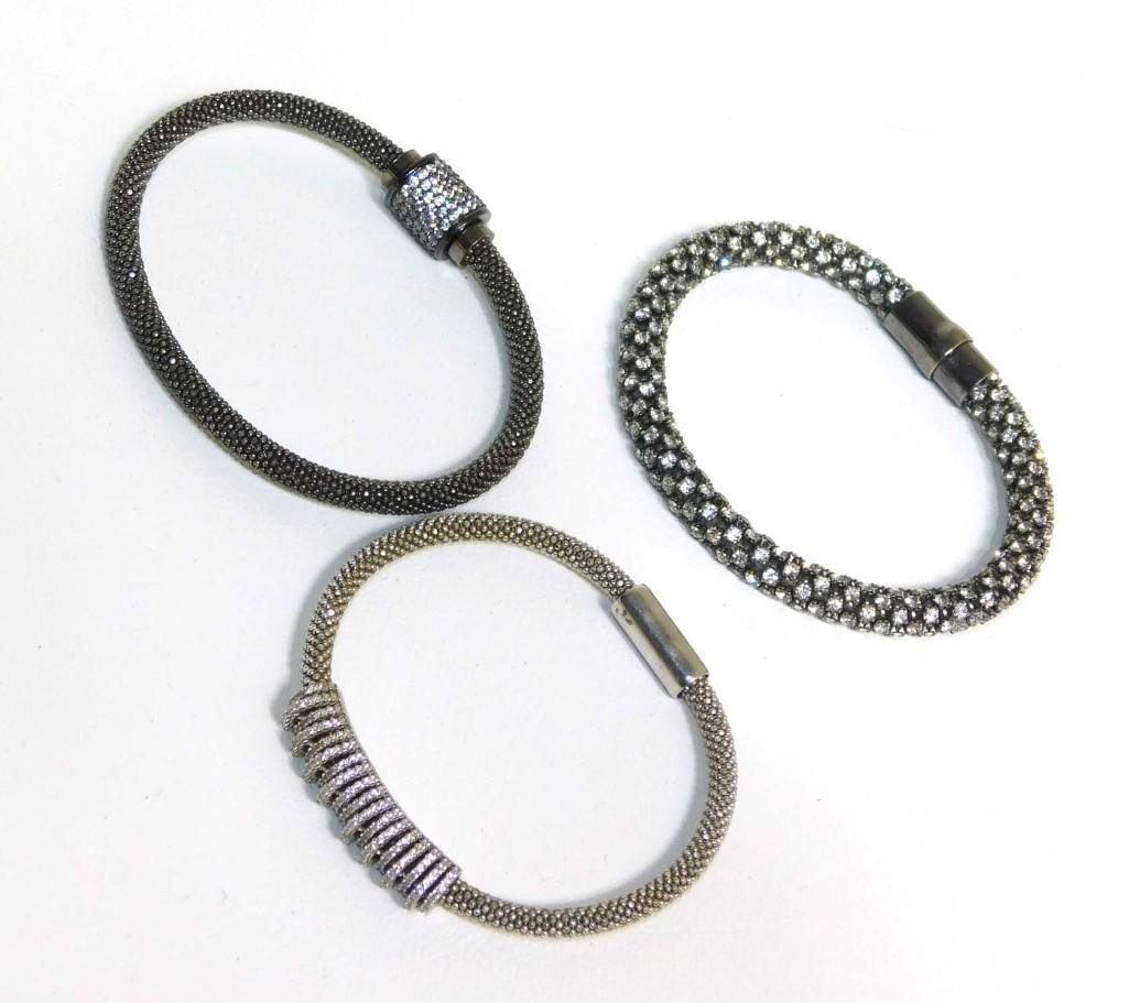 3 Bracelets- Each Marked .925 on the Clasp: 3 Bracelets- Each Marked .925 on the Clasp - 1.78 oz - PLEASE NOTE: any props, stands, displays, trays, and/or quarters shown in the pictures are not included with the item(s) and are shown for displa