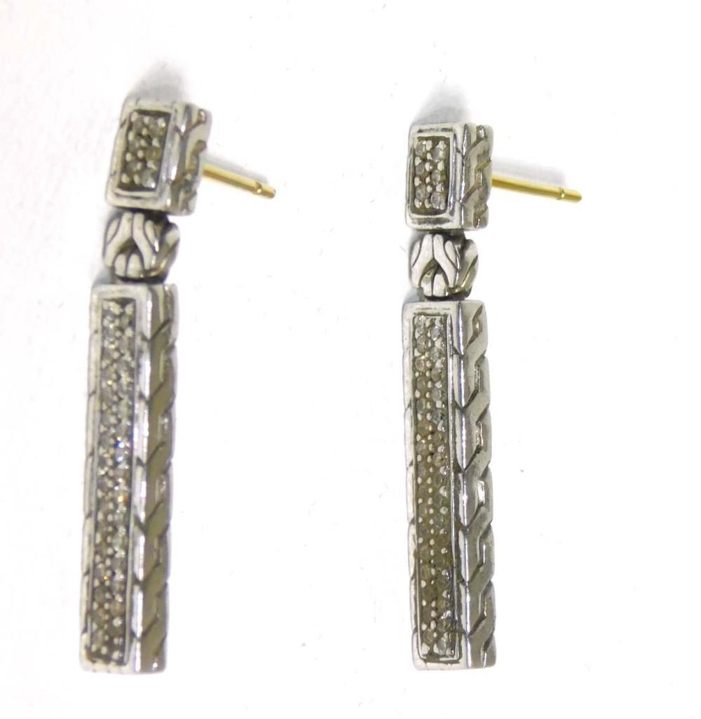 Pair of Sterling Earrings With 18K Gold Accent: Pair of Sterling Earrings With 18K Gold Accent - 7.40g Total - PLEASE NOTE: any props, stands, displays, trays, and/or quarters shown in the pictures are not included with the item(s) and are shown fo