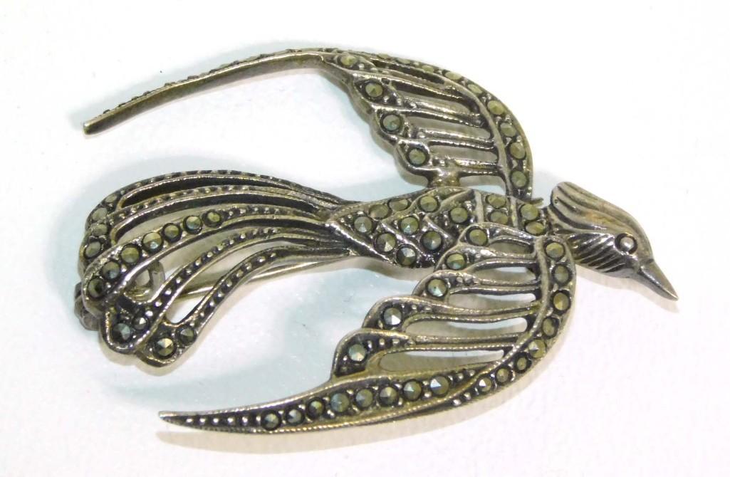 Sterling Silver and Marcasite Bird Brooch or Pin: Sterling Silver and Marcasite Bird Brooch or Pin PLEASE NOTE: any props, stands, displays, trays, and/or quarters shown in the pictures are not included with the item(s) and are shown for display and/