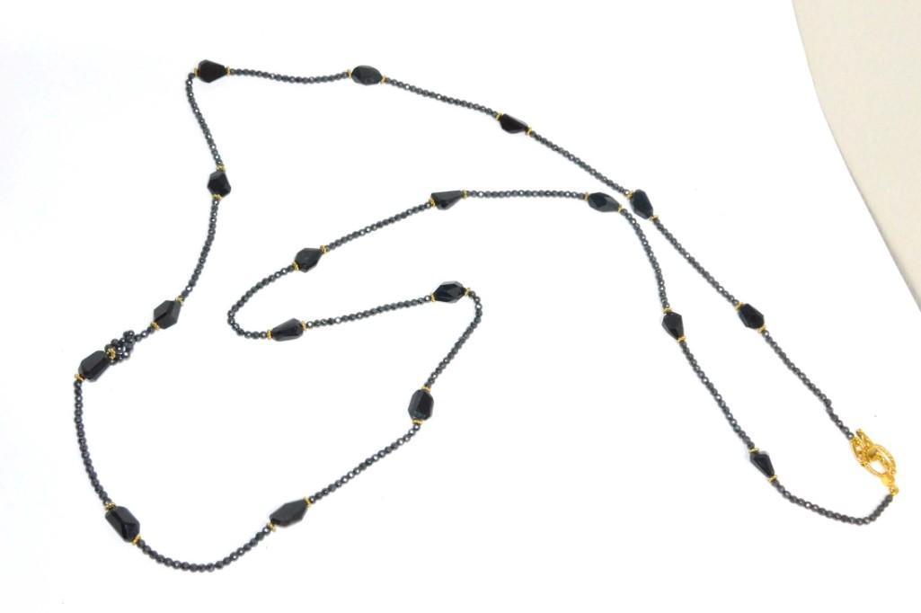 Onyx and Hematite Necklace: Onyx and Hematite Necklace PLEASE NOTE: any props, stands, displays, trays, and/or quarters shown in the pictures are not included with the item(s) and are shown for display and/or size reference only