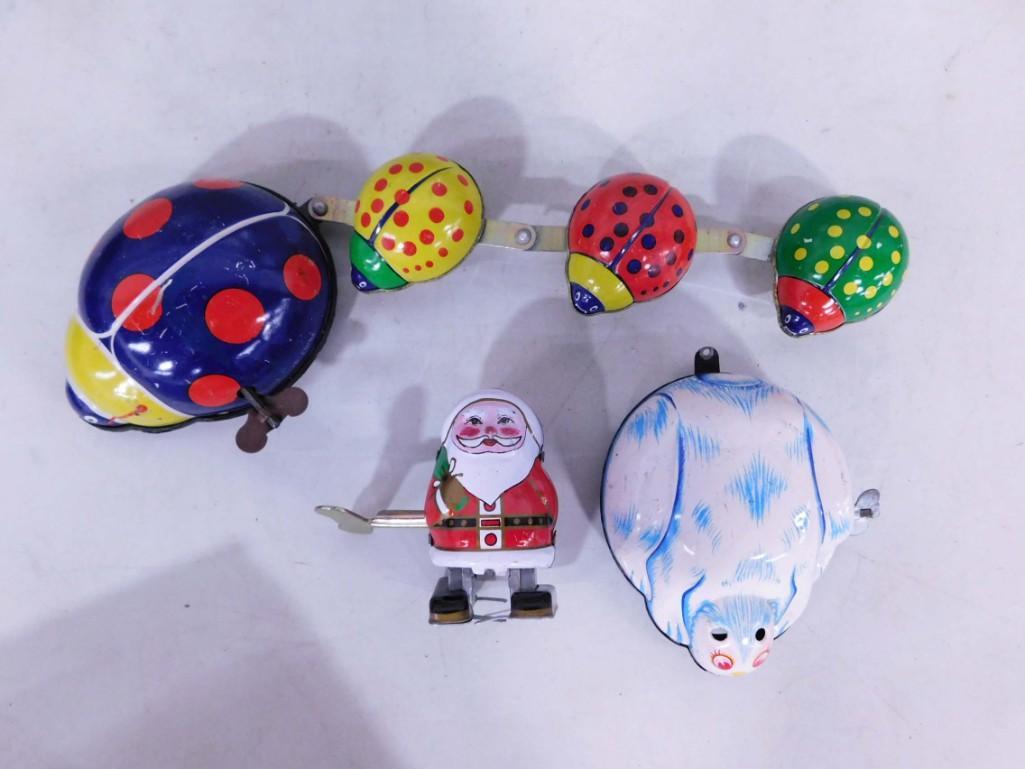 Wind Up Tin Toys incl Lady Bugs, Polar Bear, Santa Claus: Tin Wind-Up Toys incl Lady Bugs, Polar Bear, Santa Claus Condition: The winder in the Santa Claus appears to have been replaced and can be used to wind it but it is loose and removeable. All of the to