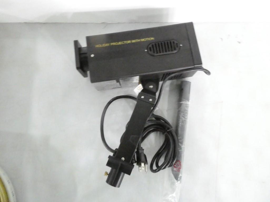 Holiday Projector with Motion: Holiday Projector with Motion . Slides not includes. Turns on