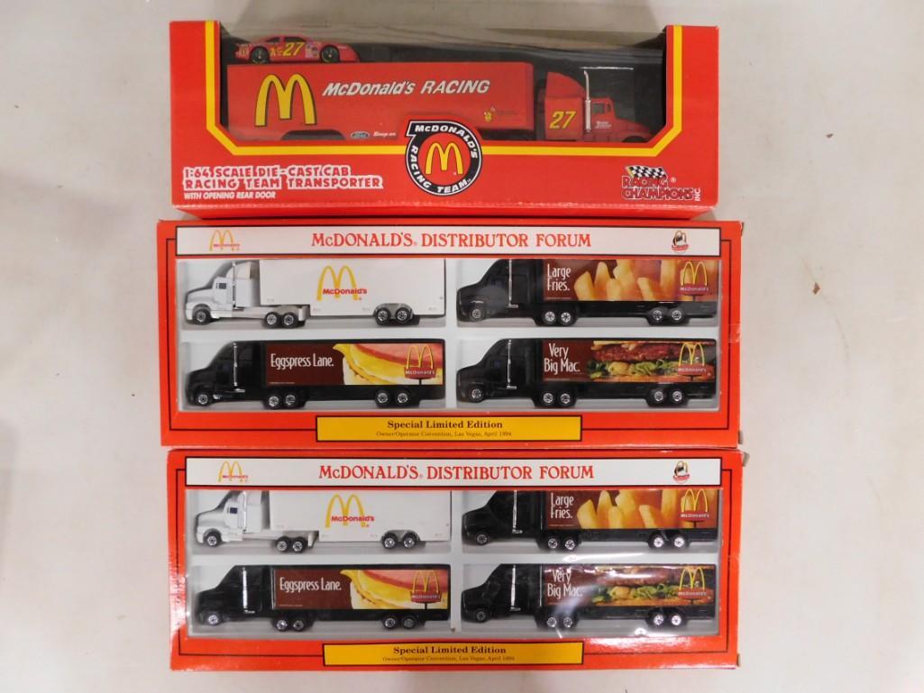 2 McDonald's Distributor Forum Limited Edition 4 Truck Packs and a Racing Champions McDonald's Racin: 2 McDonald's Distributor Forum Limited Edition 4 Truck Packs from the 1994 McDonald's Convention in Las Vegas and a Racing Champions McDonald's Racing Team Die Cast Car and Racing Team Tra