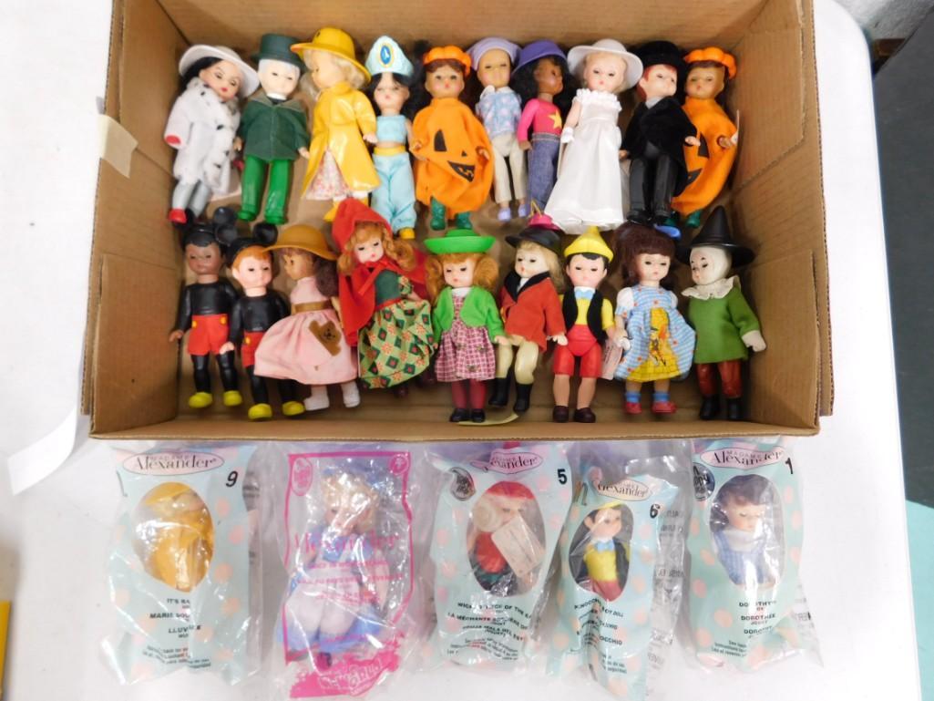 24 McDonalds Madame Alexander Dolls Lot: Includes 24 dolls. Dolls are approximately 5" tall, posable, with sleep eyes. Clean, some are new in package