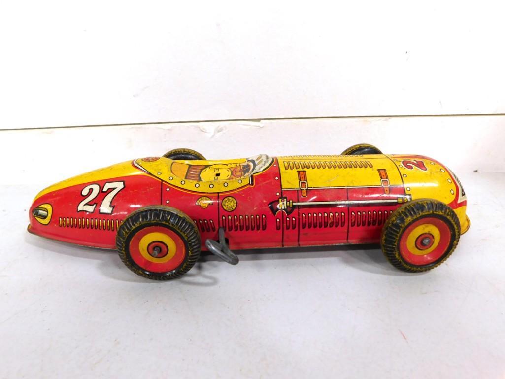 Vintage Marx Toys Wind Up Tin Toy Race Car: Vintage Marx Toys Wind Up Tin Toy Race Car . Says "Indianapolis 1948 1st Place ) on the side. Condition: Does not wind up, has no driver, some scratches.
