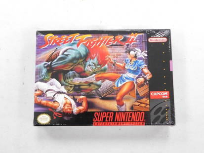 Factory Sealed SNES Street Fighter II Video Game: Factory Sealed SNES Super Nintendo Street Fighter II Video Game The shrink wrap is in good shape. It still has the hanger on it, although the hanger has yellowed a bit, otherwise it's in great shape a