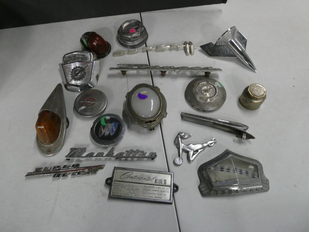 Lot full of vintage car emblems and other car pieces (1 of 7)