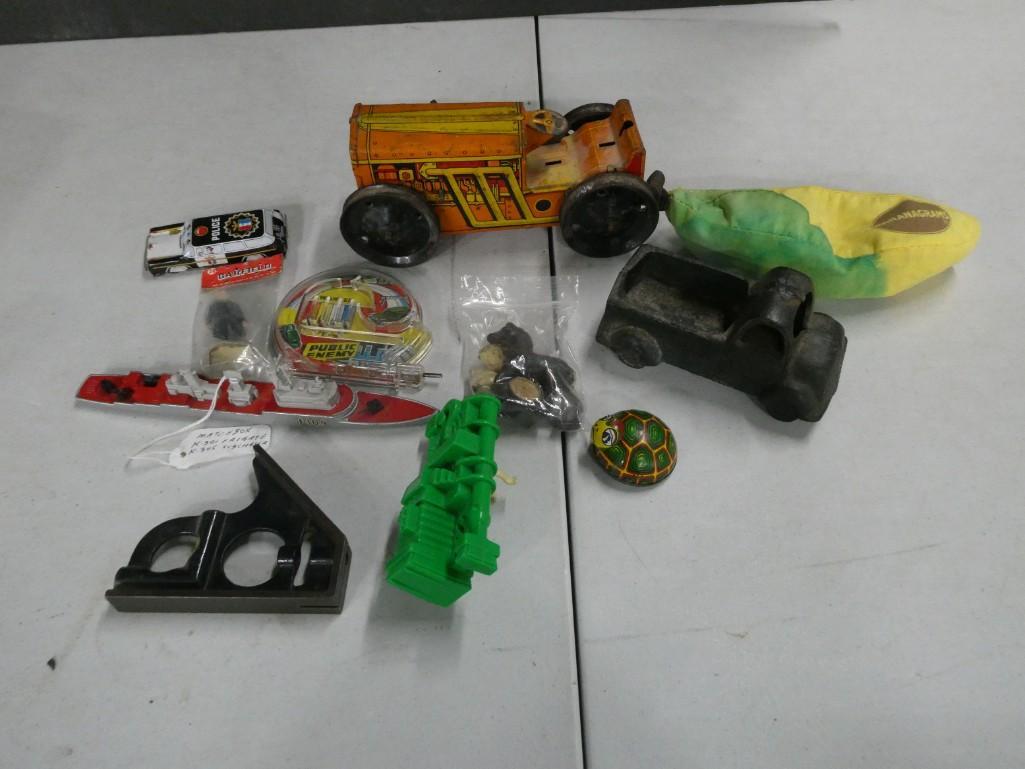 Misc. Toy Lot including Wind up Car, Matchbox Boat, Spring ball game, Bananagrams game, Cast Iron ca (1 of 8)