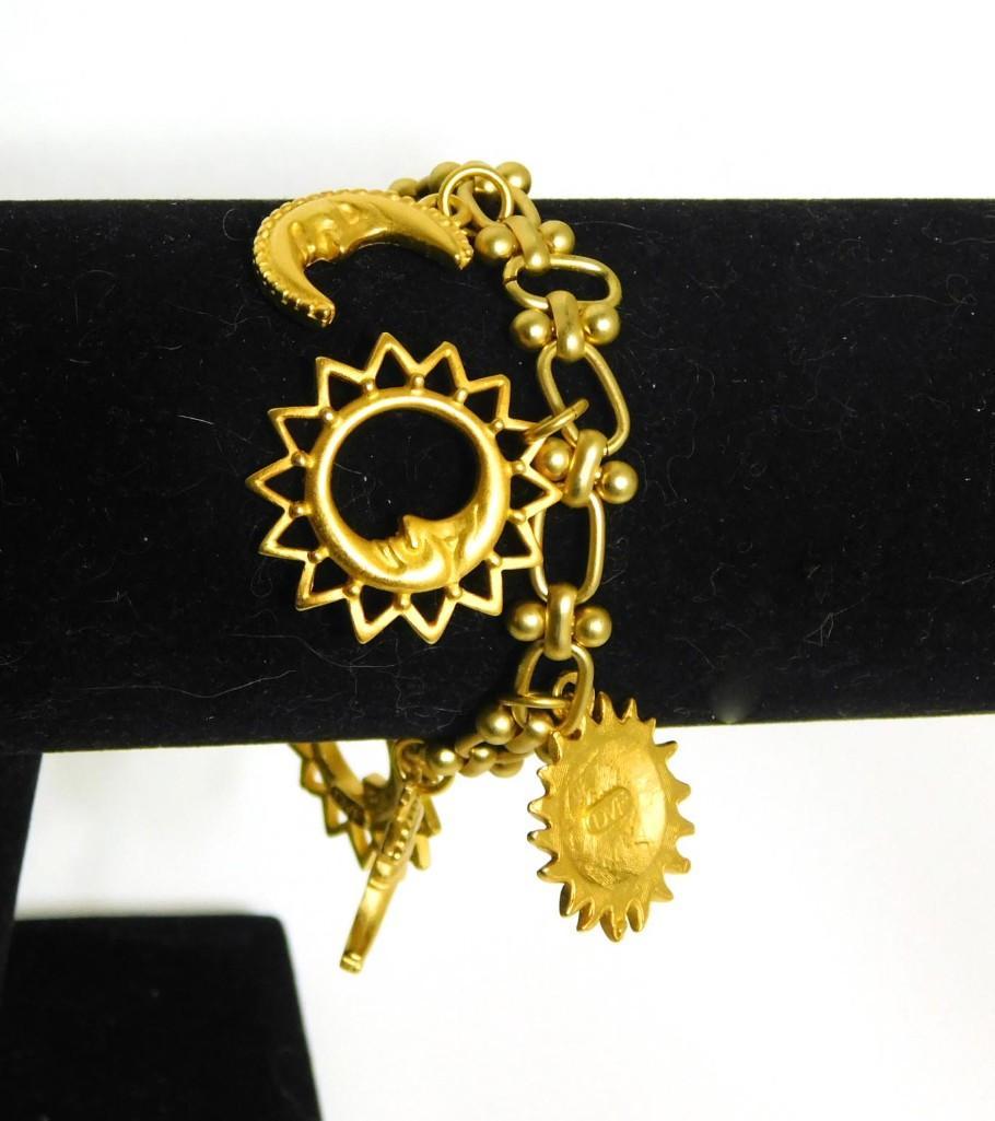 Diane von Furstenberg Sun and Moon Charm Bracelet: Diane von Furstenberg DVF Sun and Moon Charm Bracelet Note: quarter is not included