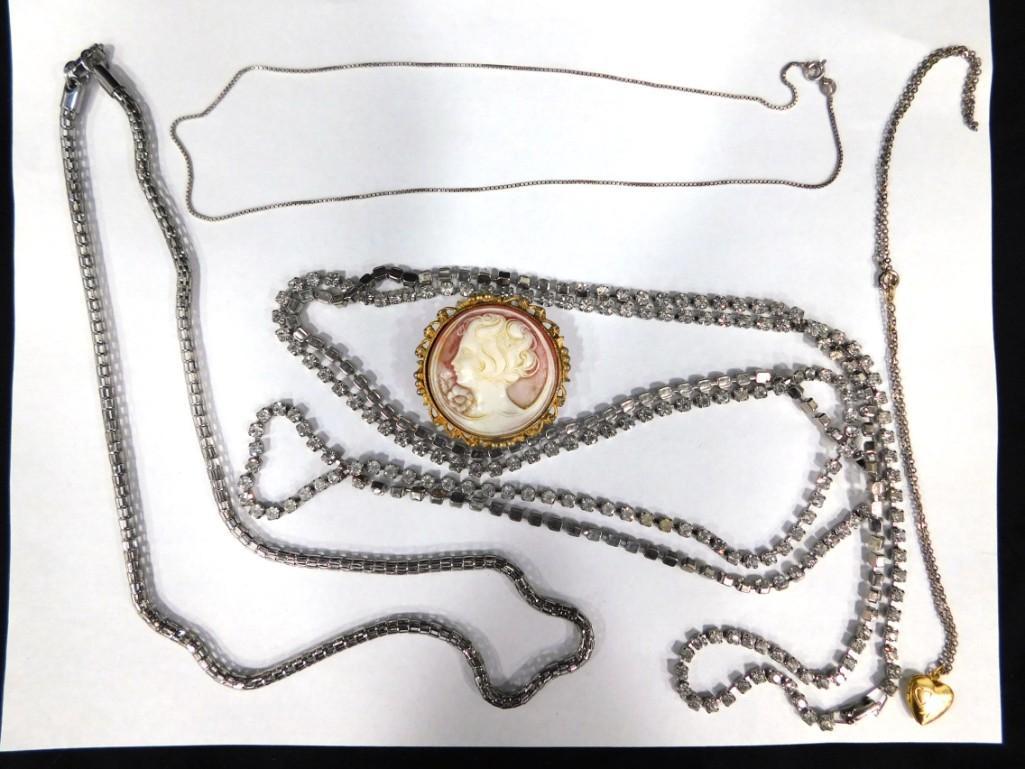 Costume Jewelry incl Sterling Silver, Rhinestone, Cameo, Etc: Lot of Costume Jewelry incl Sterling Silver, Rhinestone, Cameo, Etc . Includes an 18" .925 chain