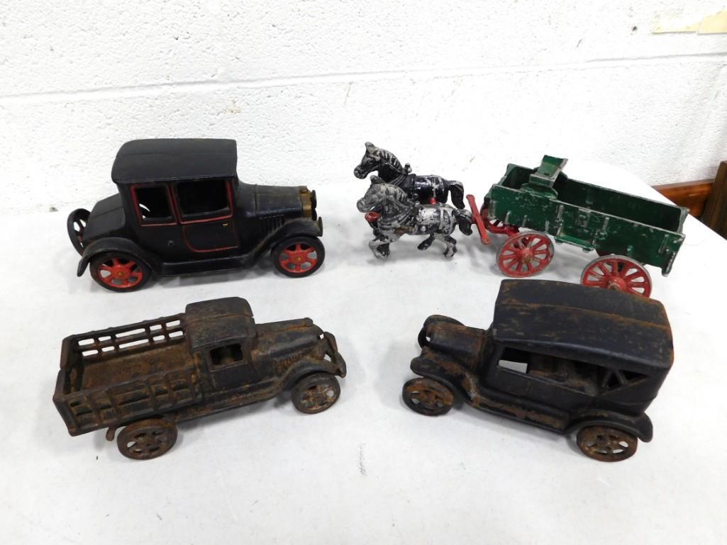 Cast Iron Toys incl 2 Cars and a Truck with Sideboards and a Cast Aluminum Wagon with Horses: Cast Iron Toys incl 2 Cars and a Truck with Sideboards and a Cast Aluminum Wagon with Horses