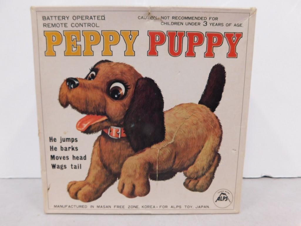 Vintage Peppy Puppy Toy Battery Operated Remote Control Jumps, Barks, Moves Head, Wags Tail: Vintage Peppy Puppy Toy Battery Operated Remote Control Jumps, Barks, Moves Head, Wags Tail . In original box. Untested. Batteries are not included