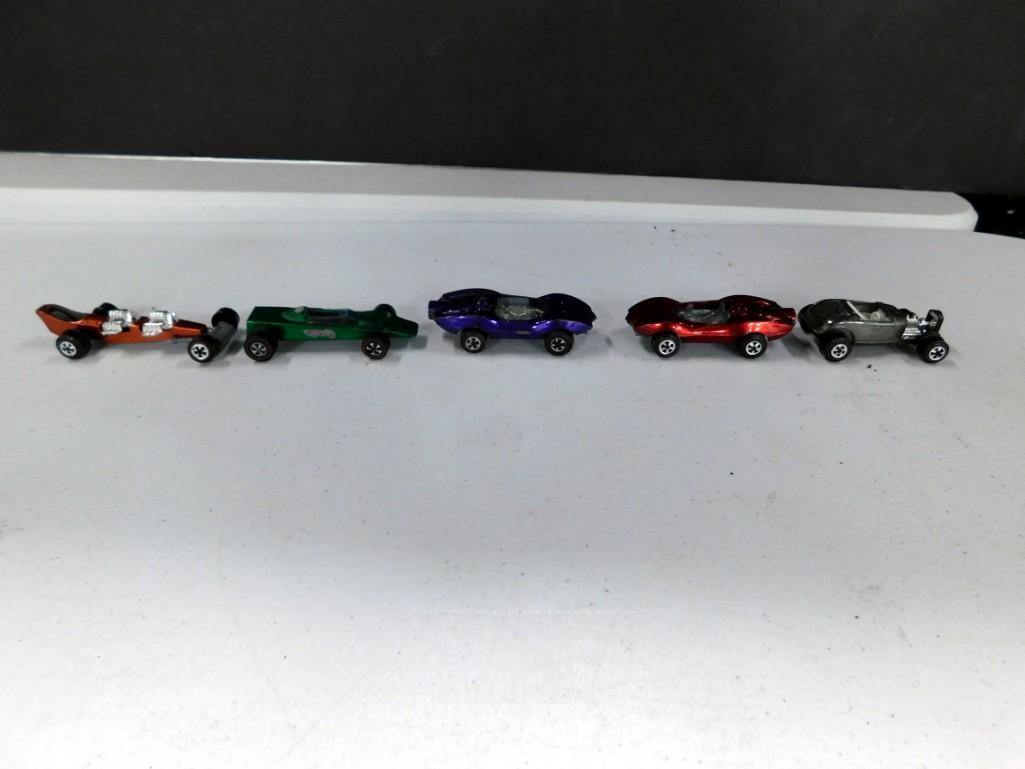 Lot of 5 Hot Wheels Red Line Cars: Lot of 5 Hot Wheels Red Line Cars - the Green one is missing a wheel, but the others have all their wheels and they have red lines. 4 appear to be Johnny Lightning
