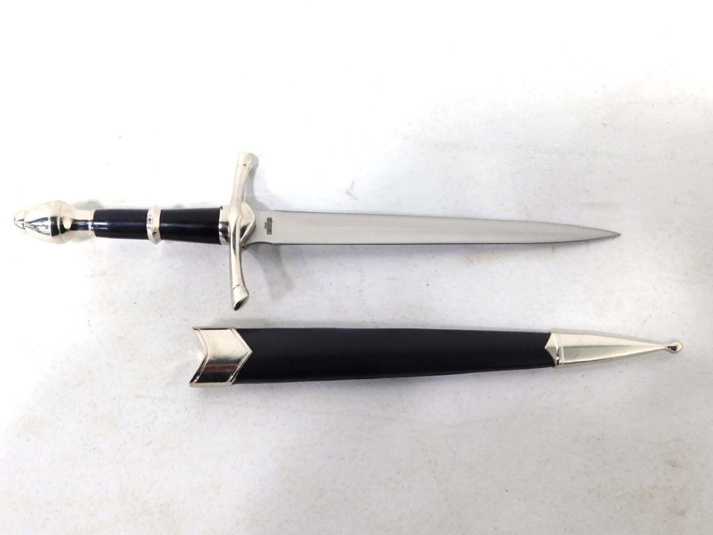 Dagger with Sheath: Dagger with Sheath . Stainless steel blade. Total length from the tip of the handle to the tip of the sheath is about 13"