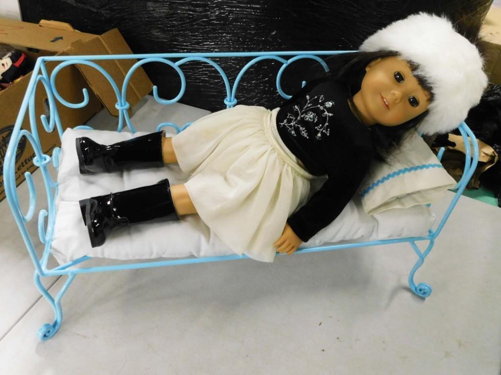 American Girl Doll 18" With Blue American Girl Curlicue Daybed: American Girl Doll American Girl of Today 18" With Blue American Girl Curlicue Daybed . Doll is stamped "Pleasant Company" on the back of her neck. Condition: Doll's joints are very lo