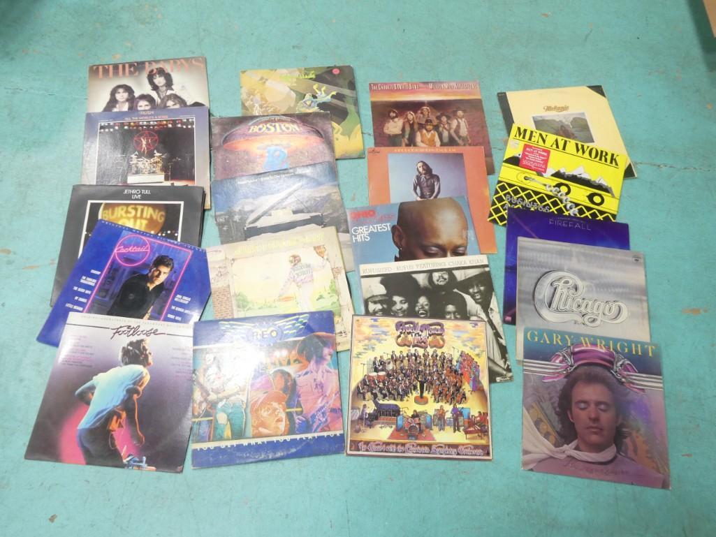 Lot of Vinyl Records including Boston, Greenslade, REO Speedwagon, Ohio Players, Men at Work (1 of 4)
