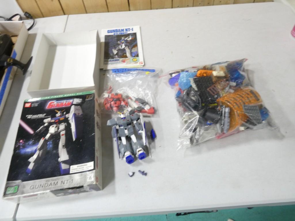 Bandai Gundam Mobil Suit with Box and Bag of Asst Lego Blocks, etc: Bandai Gundam Mobil Suit with Box and Bag of Asst Lego Blocks, etc Condition: not checked for completeness. Comes with everything shown in the pictures