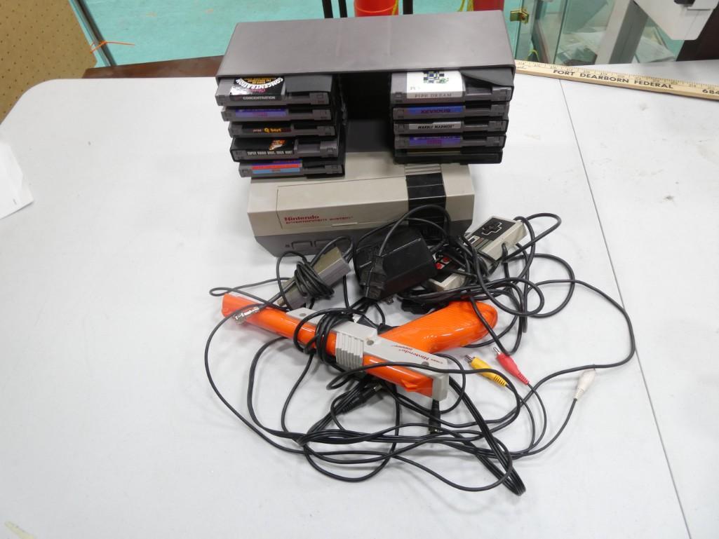 Nintendo NES, 1 Controller, Light Gun, 10 Games: Nintendo NES, 1 Controller, Light Gun, 10 Games . Games incl Tetris, Marble Madness, Qbert, Pac Man, Pipe Dream, Xevious, NES Open, etc